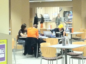A group of UW students are seen studying hard (or as it appears) in the Union.